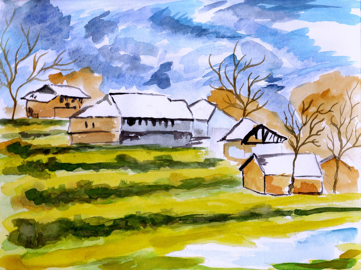 Farmhouse: A farmhouse among green fields under a breezy blue sky.